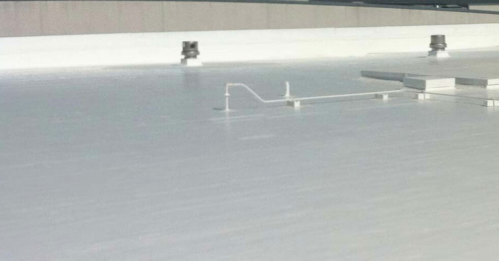 Newly installed Spray Polyurethane Foam (SPF) Roofing in Franklin's Commercial roof
